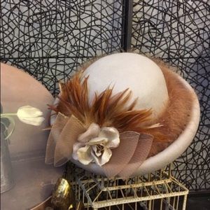 Beautiful oat bowler with amber feather accents